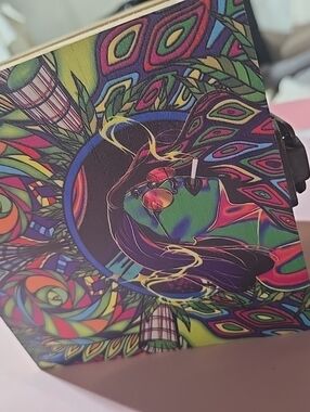 Psychedelic Colorful Art Box with Vibrant Peacock Design
